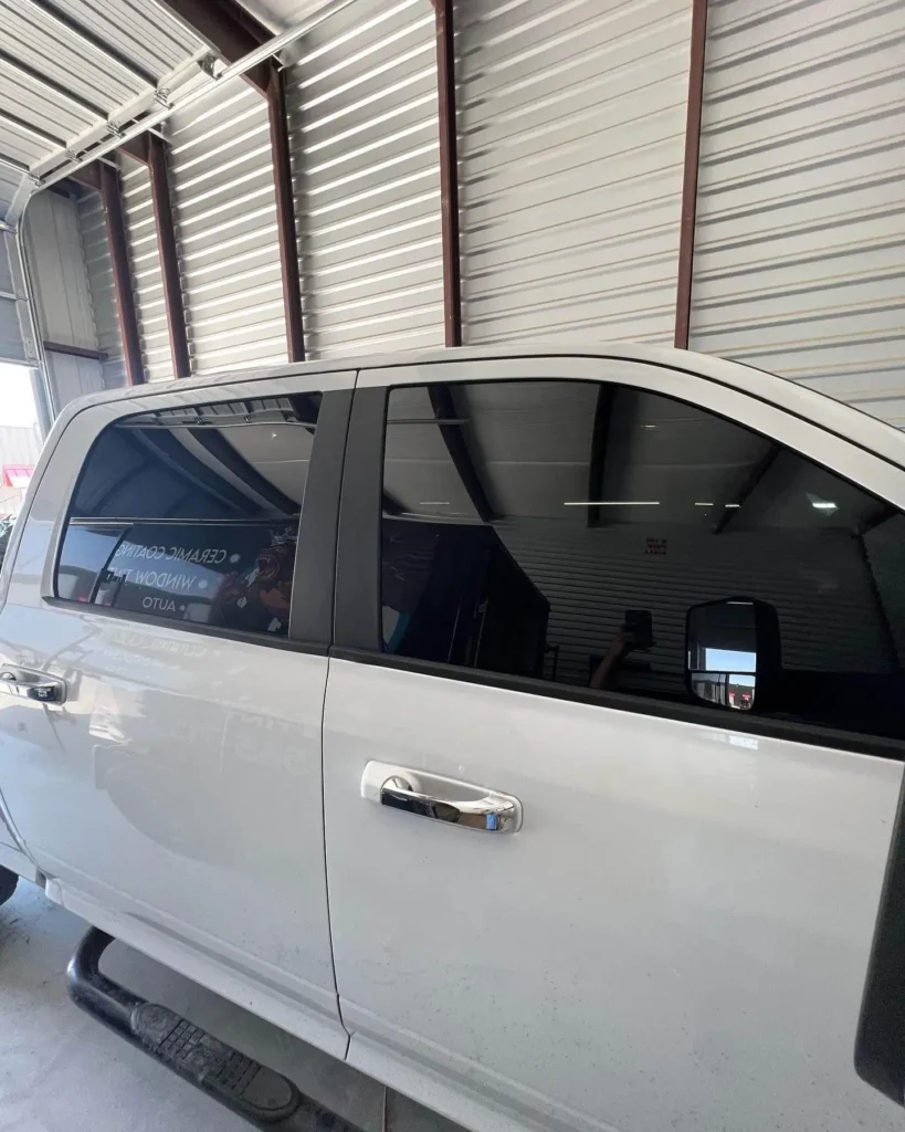 Window tinted white car taken by king tint and detail