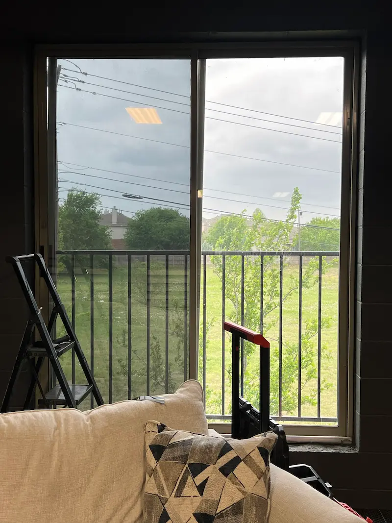 Residential home windows with professionally installed window film in Pflugerville
